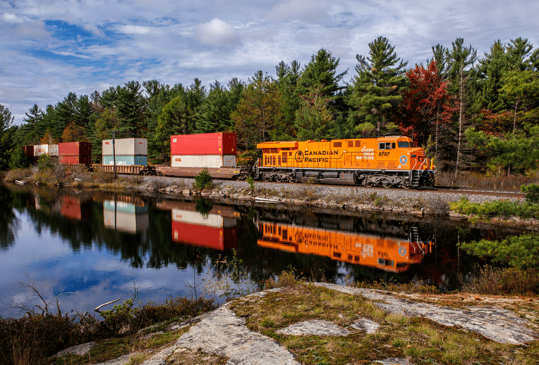 CP Orange Shirt locomotive with intermodal containers
